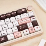 Close-up of unique Fantasy Information PBT dye-sub keycaps, revealing retro-futuristic digital data streams and abstract vintage tech aesthetics.