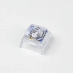 Elegant transparent Frieren artisan keycap from Beyond Journey's End, showcasing its intricate design from a unique angle, perfect for anime fans.