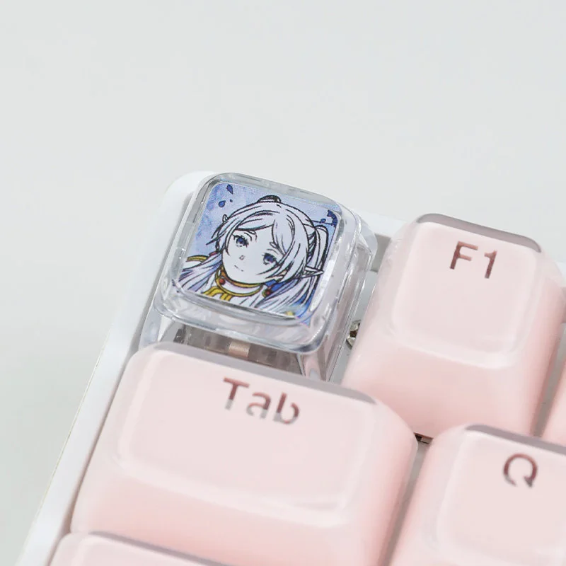 An exclusive Frieren transparent artisan keycap, exquisitely designed with Frieren from Beyond Journey's End, capturing her magical world and serene.