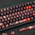 Exclusive Genshin Impact Hu Tao artisan keycaps, showcasing vibrant character art and her iconic ghost companions from multiple angles.