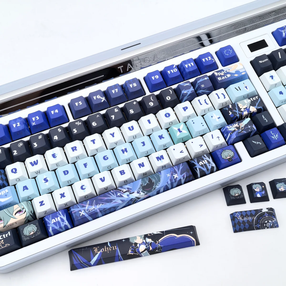 Multiple views of the exclusive Genshin Impact Lohen PBT side-engraved keycap, showcasing its mystical character art and premium texture from various angles.