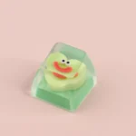 Close-up of a playful geometric monster keycap, featuring a unique design, adding whimsical personalized flair to custom mechanical keycaps.