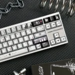 A collection of PBT dye-sub gothic style prayer keycaps from various angles, showcasing the unique spiritual sanctuary theme, ancient iconography, and metallic sheen.