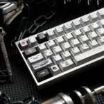 An artistic angle of the PBT Dye-Sub Gothic Style Prayer Keycaps, revealing intricate ancient spiritual iconography and a unique metallic sheen