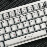 PBT dye-sub gothic style prayer keycaps. Multiple angles reveal intricate ancient sacred iconography, unique metallic sheen, and durable PBT.
