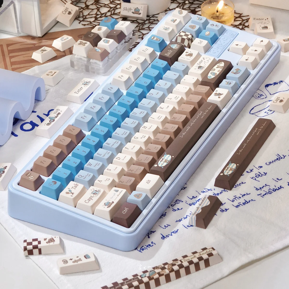 Gourmet Sea Salt PBT Dye-Sub 145 keycaps. Multiple angles show warm browns, creamy whites, subtle grey, evoking premium chocolate.