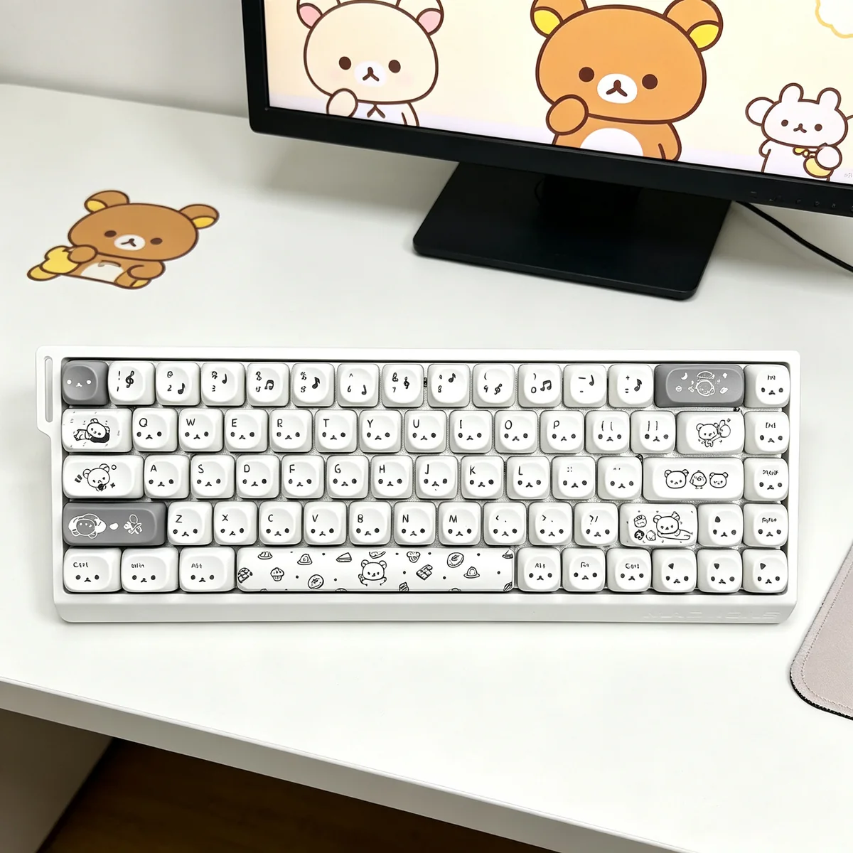 Exclusive Gray Rilakkuma PBT MOA keycap set, showcasing beloved characters in a sophisticated, minimalist palette. This artistic collection elev