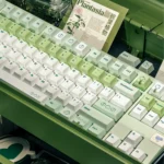 Close-up of the vibrant Green Apple Paradise PBT Dye-Sub Keycaps, showcasing the playful, nostalgic green apple orchard theme from a unique angle.