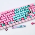 Premium Hisoka and Illumi Zoldyck PBT MDA keycap set from multiple angles, showcasing its dark, mysterious Hunter x Hunter aesthetic and signature motifs.
