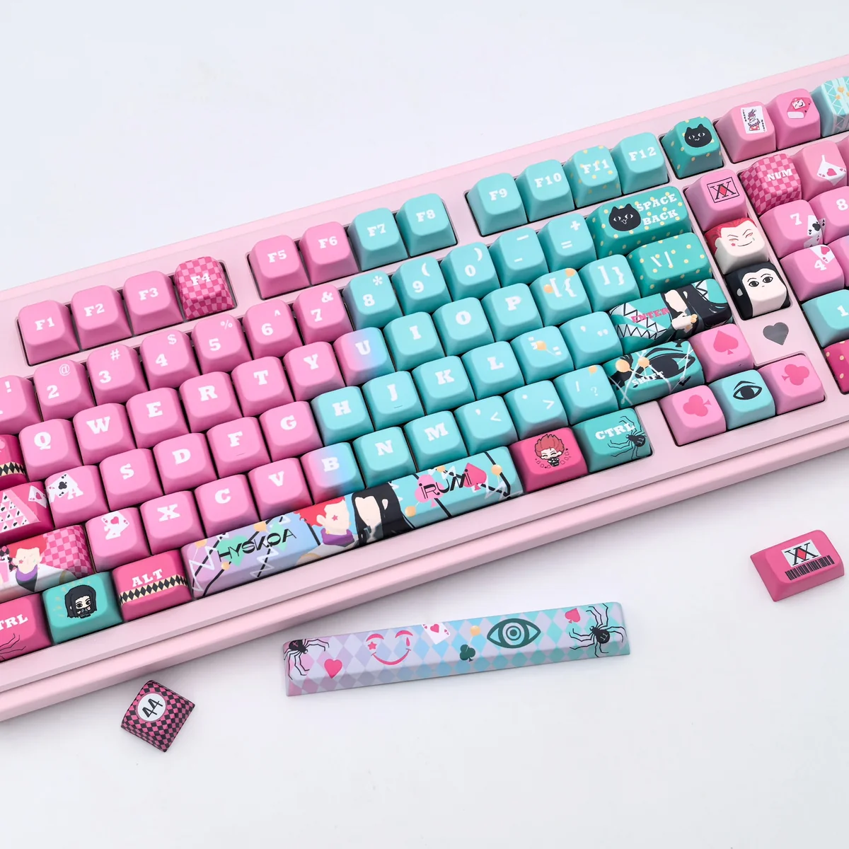 Premium Hisoka and Illumi Zoldyck PBT MDA keycap set from multiple angles, showcasing its dark, mysterious Hunter x Hunter aesthetic and signature motifs.