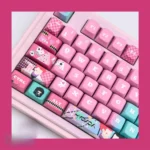 Premium Hisoka and Illumi Zoldyck PBT MDA keycaps. Angled views showcase the dark, mysterious Hunter x Hunter tribute and signature motifs.