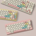 Iridescent Milky White Breakfast PBT Dye-Sub Keycaps featuring charming pastel breakfast motifs, vibrant rainbow accents on milky white. Durable and unique.