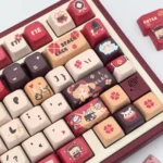 Gallery of Klee's Explosive Charm Genshin Impact MDA keycaps. View vibrant red and orange Klee keycaps, highlighting playful explosive character.