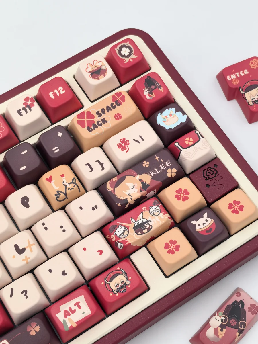 Gallery of Klee's Explosive Charm Genshin Impact MDA keycaps. View vibrant red and orange Klee keycaps, highlighting playful explosive character.