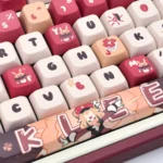 Close-up of vibrant red and orange Klee Genshin Impact MDA keycaps, highlighting explosive charm and playful character art from the exclusive set.