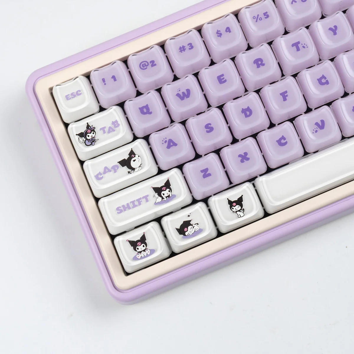 A playful, jelly Kuromi keycap set for magnetic switches, captured from a unique angle, highlighting its design and vibrant RGB design.