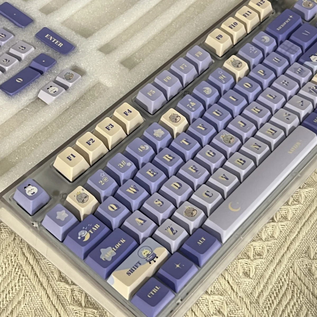 Exclusive Love Deepspace Xavier keycap, a vibrant collectible showcasing detailed character art from various angles.
