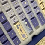 Close-up view of the exclusive Love Deepspace Xavier keycap, showcasing its vibrant, detailed character art from a unique perspective.