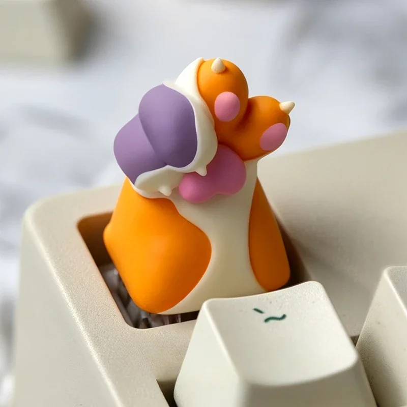 Adorable handcrafted resin Cat Paw Keycap, a charming and unique addition bringing playful feline personality to any mechanical keyboard.