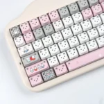 Playful Miffy Cat Ear RGB Keycap Set from a fresh angle, highlighting its vibrant RGB lighting and whimsical glowing ears.
