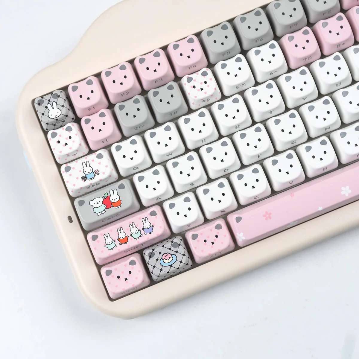 Playful Miffy Cat Ear RGB Keycap Set from a fresh angle, highlighting its vibrant RGB lighting and whimsical glowing ears.