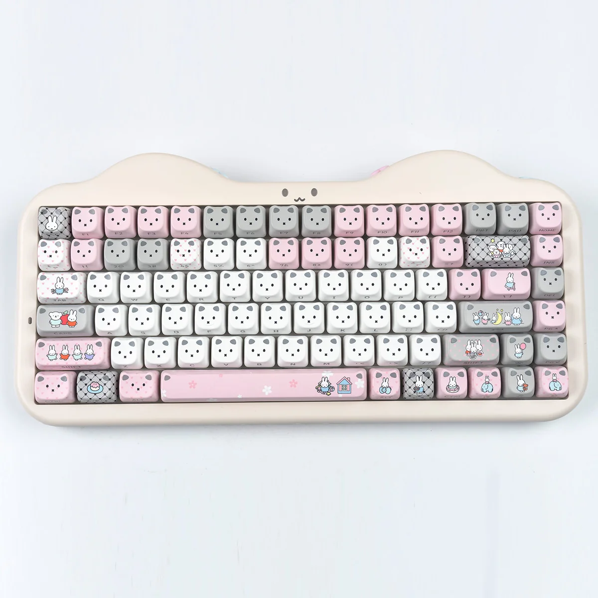 Whimsical Miffy keycap set featuring glowing cat ears and vibrant RGB lighting, showcasing a playful magnetic switch design.