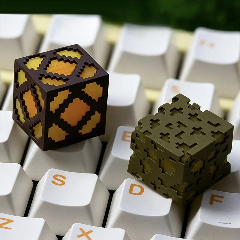 Detailed view of the iconic Minecraft Glowstone keycap, featuring its handcrafted translucent resin with a playful, pixelated glow.