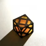Iconic Minecraft Glowstone keycap, handcrafted from translucent resin with pixelated blocky details, shown from a unique angle, perfect for gaming keyboard.