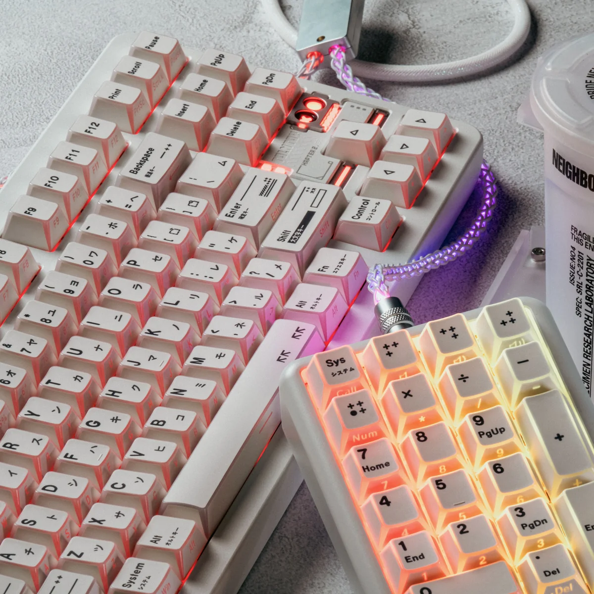 Minimalist white side-printed PBT keycaps, highlighting unique light refraction and hidden legends from various views for backlit.