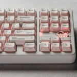 Minimalist White Side-Printed PBT Keycaps gallery. Features clean PBT, unique light refraction, and subtle side-printed legends.