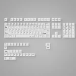 Minimalist white side-printed PBT keycaps showcasing unique light refraction and hidden legends for a clean, premium aesthetic.