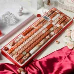 Vibrant the heart and rose oil painting MOA keycap set with a smooth ceramic glaze finish, artistically displayed from multiple angles.