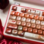 A gallery of The Heart and Rose Oil Painting MOA Keycaps, showcasing their vibrant artistic design and smooth ceramic glaze finish from multiple angles.
