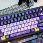 Premium Overwatch Moira PBT dye-sublimated keycaps, showcasing intricate details and futuristic design from various perspectives.