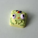 Whimsical PEAK Bing Bong artisan keycap, handcrafted with vibrant, intricate sculpted details, showcasing unique keyboard artistry.