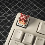 Handcrafted Princess Mononoke San resin artisan keycap, captured from a unique angle, showcasing its vibrant details and whimsical animated aesthetic.