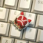 Handcrafted Princess Mononoke San resin artisan keycap. Vibrant, intricate details and whimsical animated aesthetic from a distinct angle.