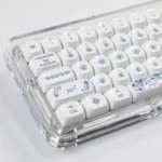 Exquisite Qinghua Porcelain PBT keycaps set. Multiple angles highlight elegant blue and white patterns, reflecting timeless classical Chinese aesthetic.