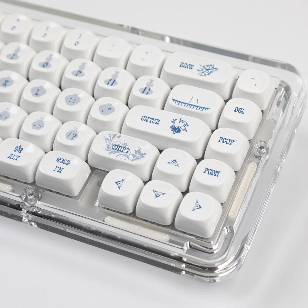 Close-up views of exquisite Qinghua Porcelain PBT keycaps set, showcasing intricate blue and white patterns from multiple angles. These elegant keycaps set.