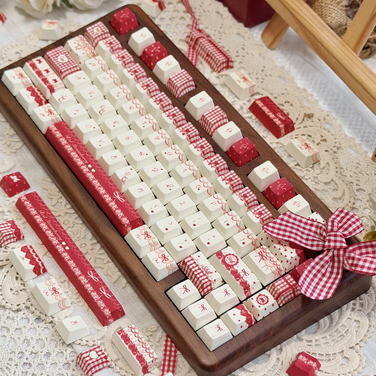 A delightful close-up of the Unique Raspberry Mousse PBT Dye-Sub Keycap Set, showcasing its soft berry and sweet dessert aesthetic.