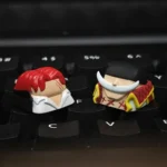 Detailed side view of the premium handcrafted ONE PIECE Red-Haired Shanks artisan keycap, highlighting its exquisite resin artistry and iconic character.