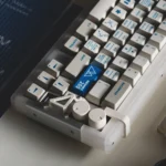 Retro Geometric PBT Dye-Sub Keycaps in Cherry Profile, captured from multiple angles, showcasing their distinctive vintage patterns and durable matte finish.
