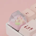 Angled view of the whimsical rose bear artisan keycap, showcasing its unique handcrafted translucent pastel resin, intricate details, and enchanting design.