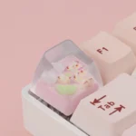 Whimsical rose bear artisan keycap in dreamy resin, handcrafted with an enchanting, translucent pastel finish for mechanical keyboards.