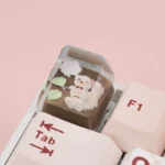 Whimsical rose bear artisan keycap, meticulously handcrafted from translucent resin. A unique, artistic ESC key accent.