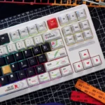 A detailed shot of the Iconic RX-93 ν Gundam PBT Dye-Sub keycaps, showcasing the futuristic mecha aesthetics and precise coloring.