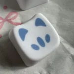 Four playful Omen Kitty PBT keycaps, featuring a stylized Valorant Omen aesthetic for a unique keyboard accent.