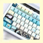 Close-up of Wuthering Waves Luuk Herssen PBT keycaps from a distinct angle, revealing intricate dark character art and premium texture, embodying its enigmatic aura for collectors.