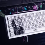 Close-up detail of Hirasawa Yui PBT dye-sub keycaps, highlighting the crisp monochrome anime art and durable premium finish on a mechanical keyboard.