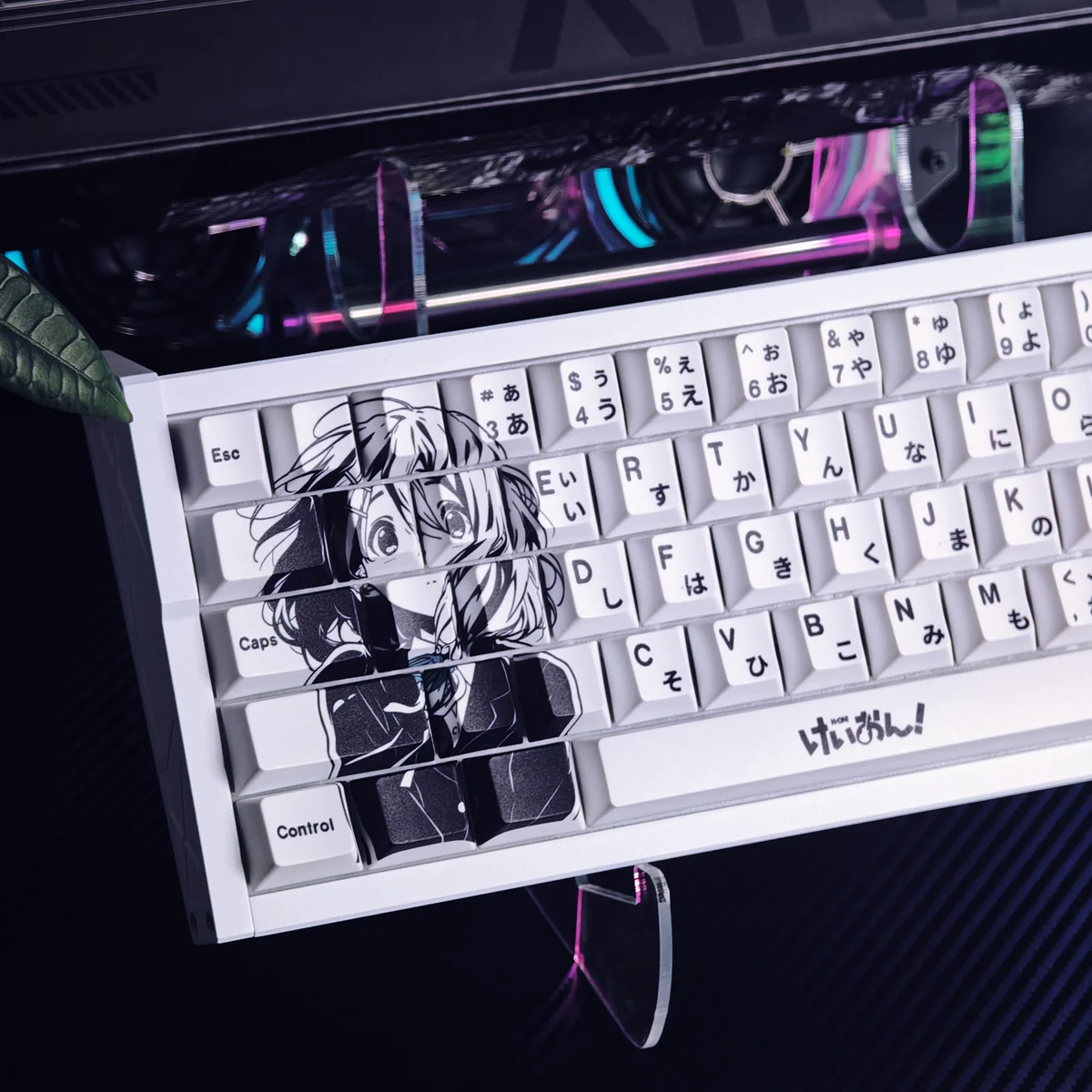 Close-up detail of Hirasawa Yui PBT dye-sub keycaps, highlighting the crisp monochrome anime art and durable premium finish on a mechanical keyboard.